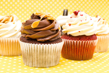 Cupcakes on yellow background