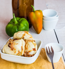 dumplings with fried onions and sour cream, Ukrainian cuisine