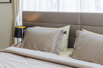 modern bedroom with black lamp