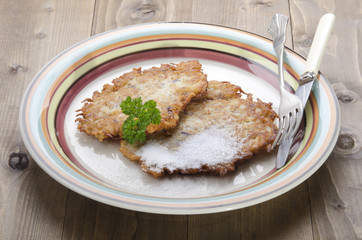potato pancake with sugar on a plate