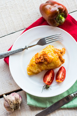 stewed meat stuffed peppers in tomato sauce