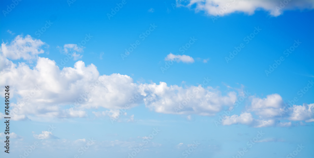 Wall mural white clouds in the blue sky