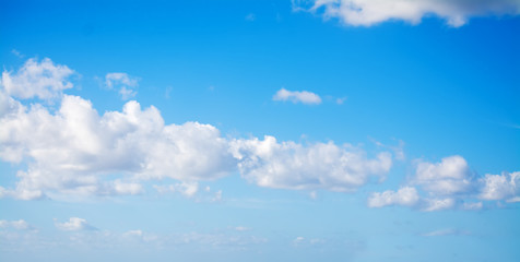 white clouds in the blue sky