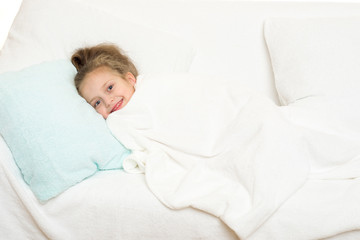 little girl in bed