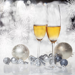 Toasting with champagne glasses on sparkling holiday background