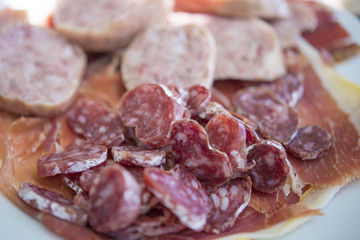 Still life of smoked chicken breast, sausage, sausages