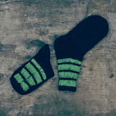 woolen socks on wooden background