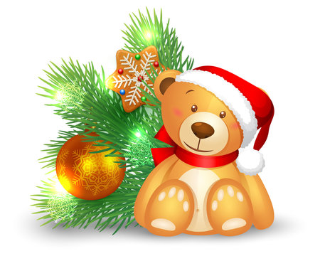 Cute teddy bear sitting near a Christmas Fir tree