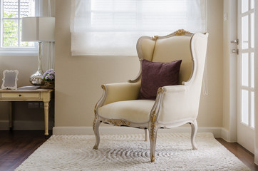classic chair style on carpet in bedroom