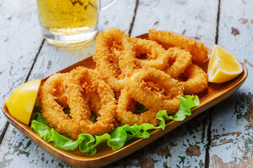 fried squid rings breaded with lemon
