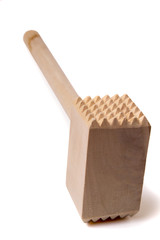 Close up view of a meat hammer isolated on a white background.