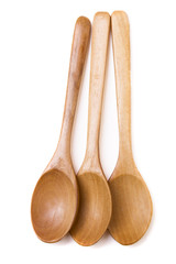 three wooden spoons isolated on white background.