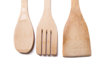 two wooden spoons and a fork 