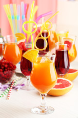 Glasses of fruit cocktails in party close-up