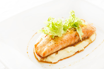 salmon steak with mashed potatoes