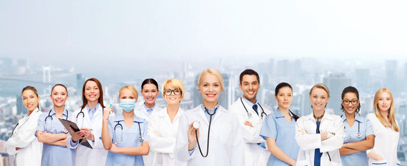 team or group of female doctors and nurses