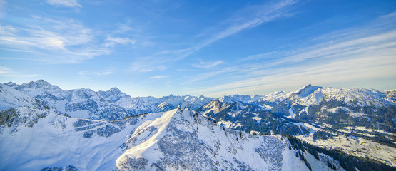 Beautiful view of snowy Alpine peaks in Austria and Germany