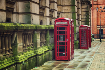 Red telephone booths in the Birmingham, UK