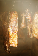 Smoked ham in a traditional way in the smokehouse