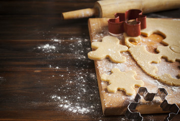 Making gingerbread cookies. Christmas baking background dough an