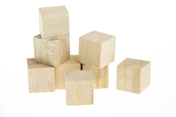 Wooden toy blocks isolated on white background