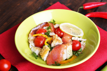 Fresh fish salad with vegetables