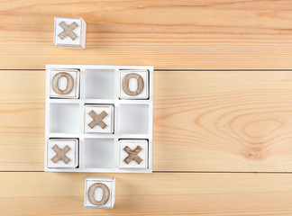 Game of Tic Tac Toe on wooden background
