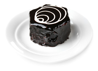 Yummy chocolate cupcake on plate close-up