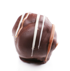 Delicious chocolate candy isolated on white