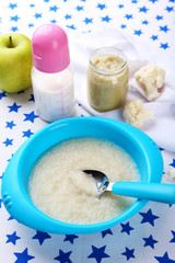 Fresh baby food in bowl with spoon