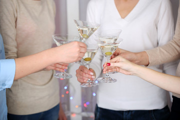 Woman hands with glasses of champagne