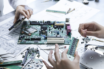 Developers who are assembling a computer parts