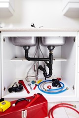 Plumber tools on the kitchen.