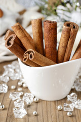 Cinnamon sticks in christmas setting