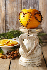 Orange pomander ball with candle. Christmas decorations