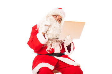 santa claus on white background using smart technology