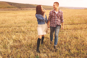 Landscape portrait of young beautiful stylish couple sensual and