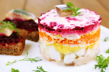 Russian herring salad  and sandwiches