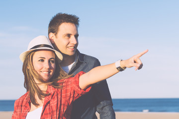 Couple in love with beach background