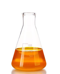 Flask with orange fluid isolated on white