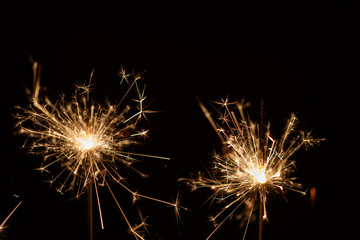 Obraz premium Christmas sparkler on black background