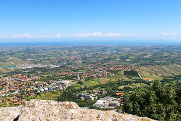 Fototapeta na wymiar View of the village from the fortress of San Marino. The Republi