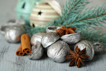 Beautiful Christmas composition with silver walnuts,