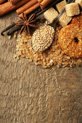 Christmas spices and baking ingredients on sackcloth background