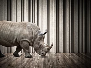 Selbstklebende Fototapeten rhino in the house © tiero
