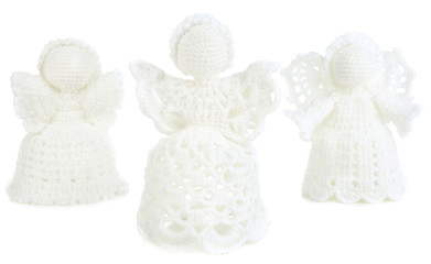 Knitted Christmas angels isolated on white