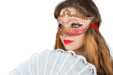 Ragazza con maschera di carnevale
