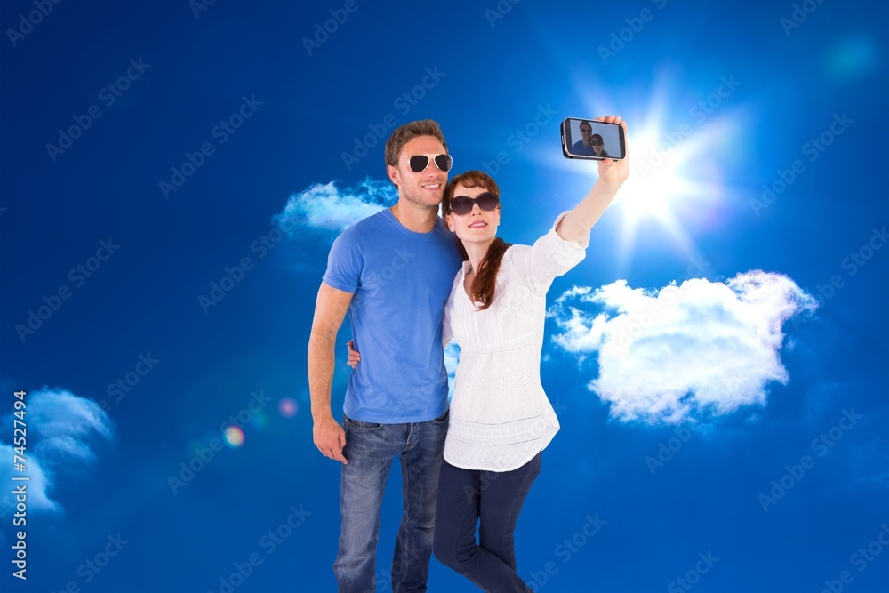 Aufkleber composite image of couple using camera for picture