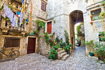 Old stone street of Trogir - obrazy, fototapety, plakaty