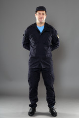security guard full body  isolated on gray background